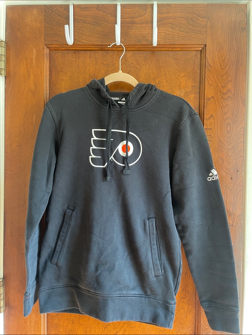 adidas Women’s Black Pullover Hoodie with White & Orange Flyers Logo